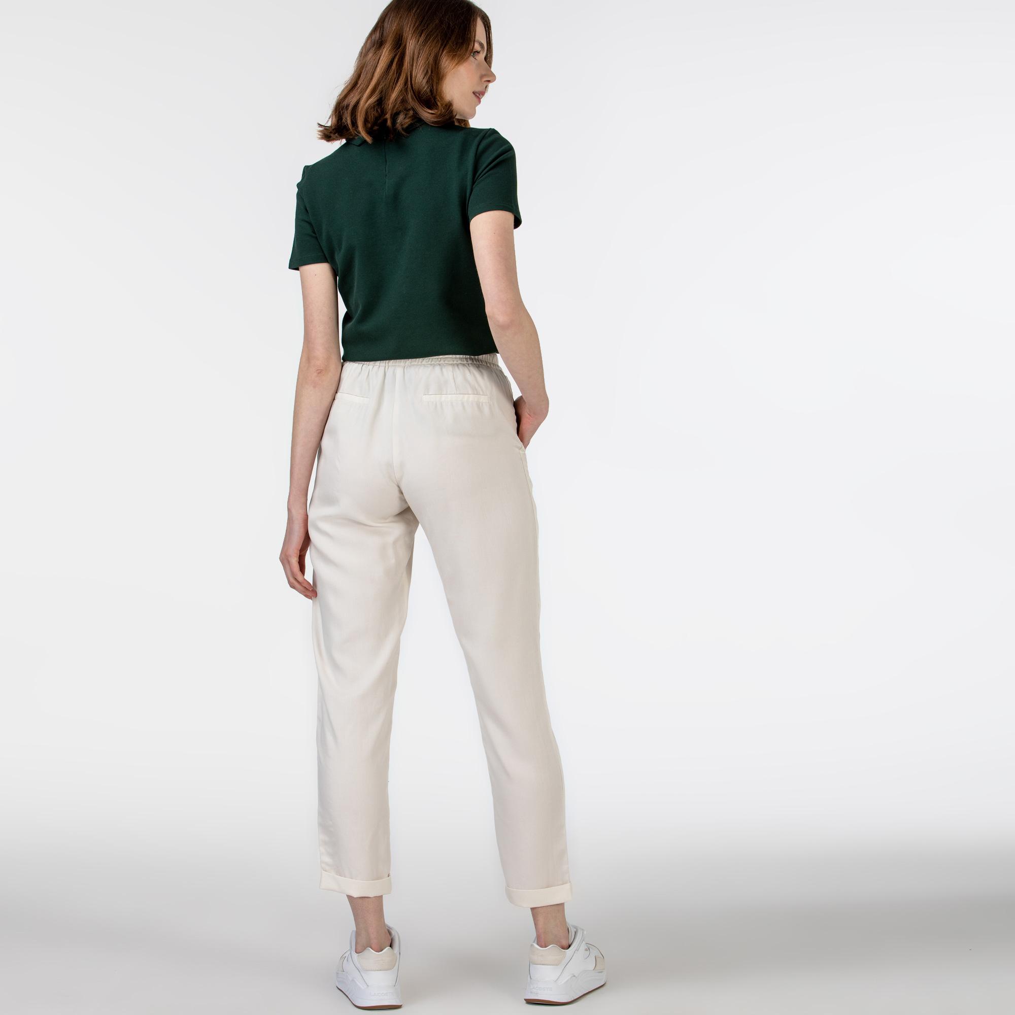 Брюки Lacoste , цвет белый, для женщин Брюки Lacoste , цвет белый, для женщин